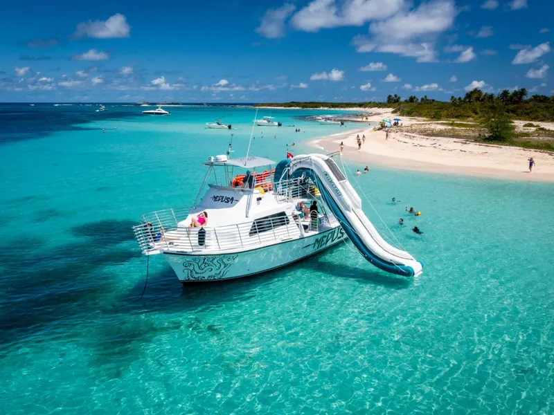 Snorkelers exploring the coral reef on an all-inclusive boat tour in Puerto Rico near Icacos Island